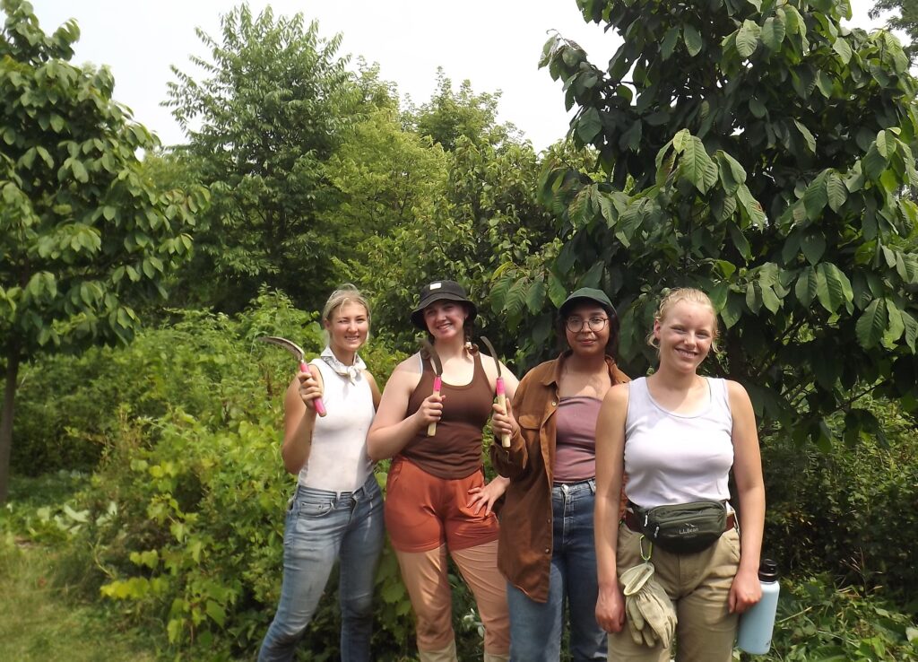 Conservation leadership interns in food forest